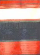 Tejido con franjas rojas, blancas y negras, una mantilla sayaguesa