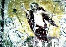 Pintura mural con figuras, una de ellas con los brazos extendidos